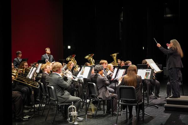 Sharon S. Jackson conducting a group of band students