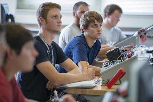 Electronics students sitting in a class together