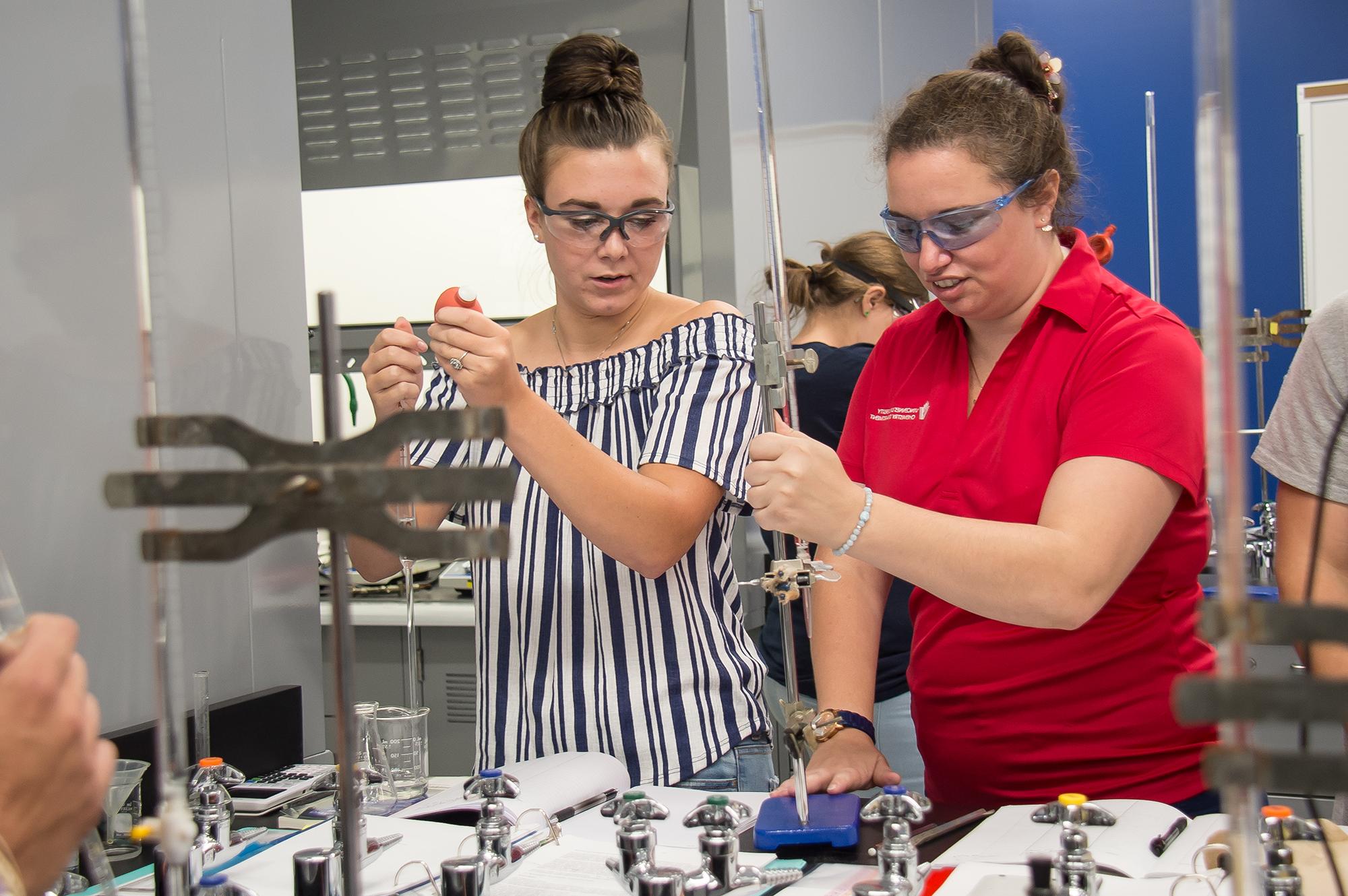 Food science majors participating in a lab